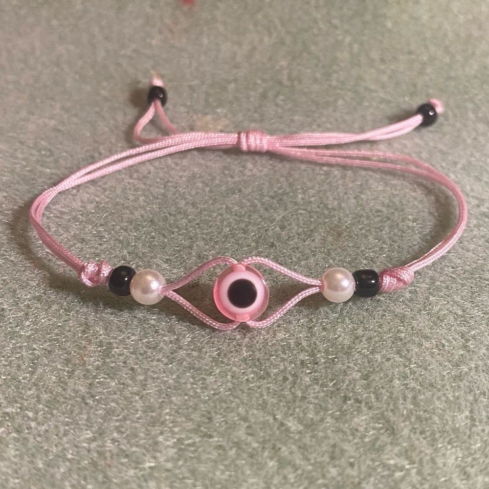 Handmade braided nylon evil eye bracelet pink
